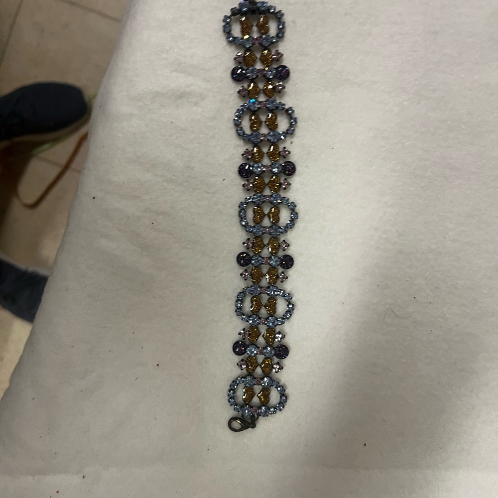 Elegant Beaded Bracelet with Purple and Gold Accents